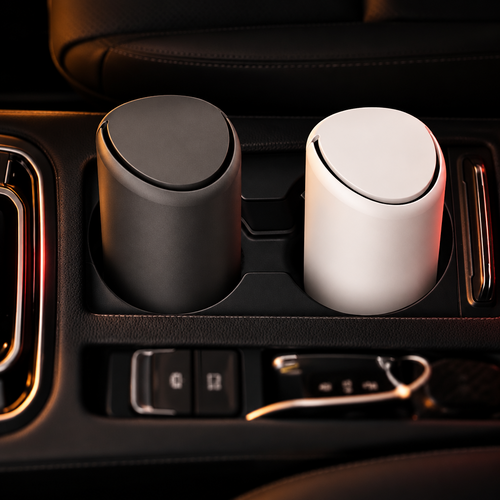 Mini poubelles de voiture Reinhardt noire et blanche dans la console centrale